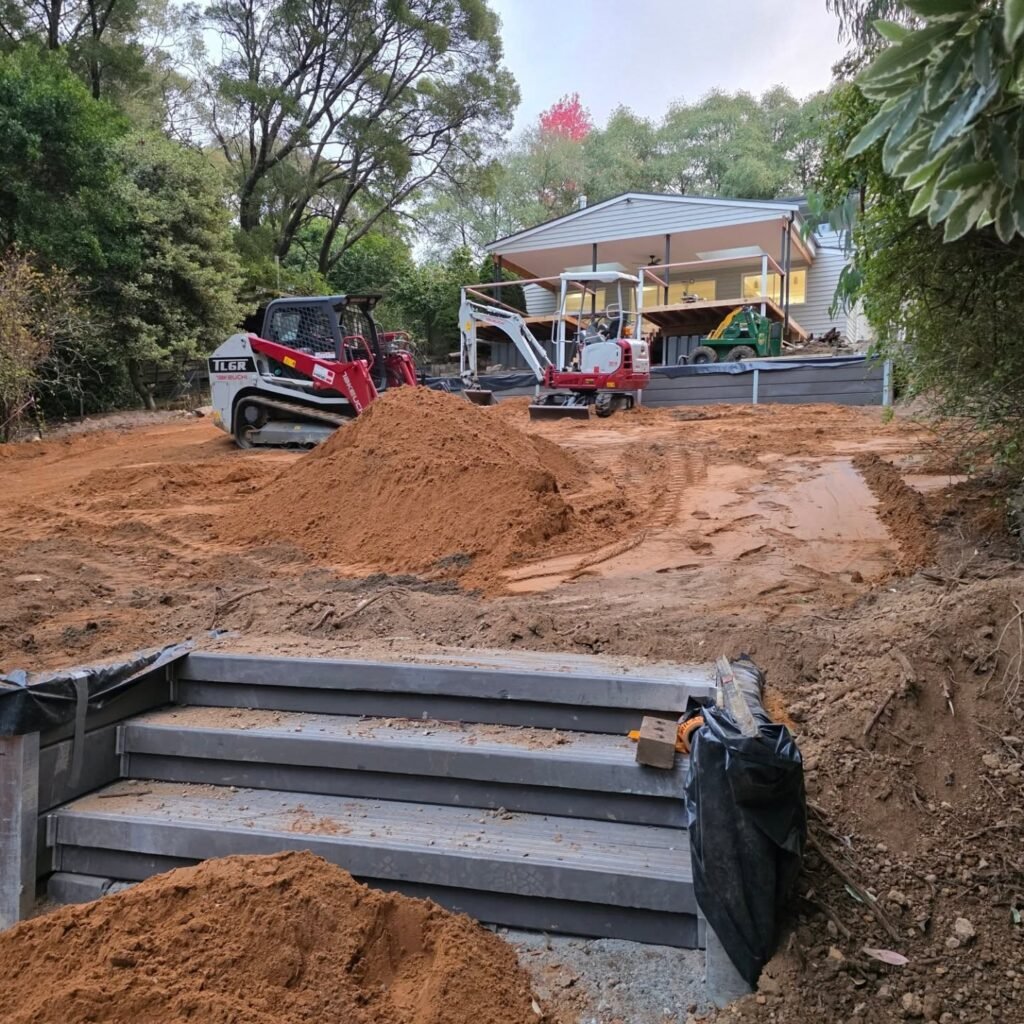 What Machinery Is Used for Excavation? Excavator and earthmoving equipment preparing a construction site for excavation work.