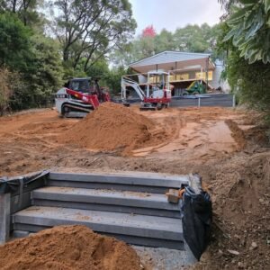 How Long Does an Excavation Project Take? 1 What Machinery Is Used for Excavation? Excavator and earthmoving equipment preparing a construction site for excavation work.