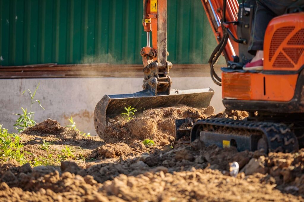 How Long Does an Excavation Project Take? Excavator carrying out site excavation for a residential construction project.