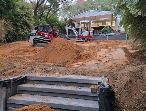 What Machinery Is Used for Excavation? Excavator and earthmoving equipment preparing a construction site for excavation work.