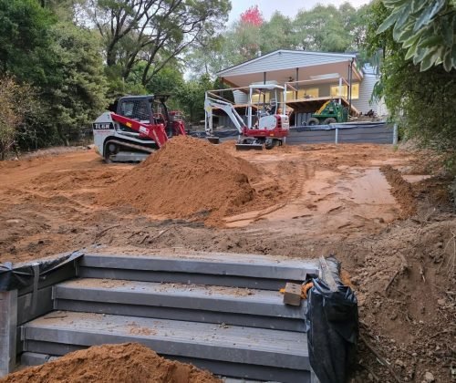 What Machinery Is Used for Excavation? Excavator and earthmoving equipment preparing a construction site for excavation work.