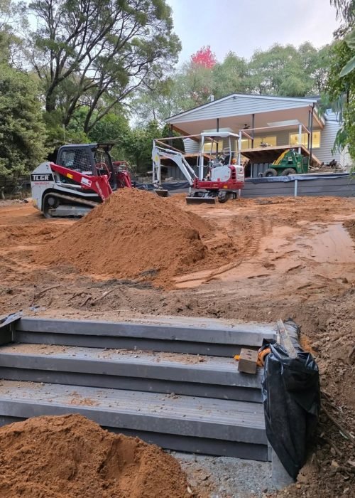 What Machinery Is Used for Excavation? Excavator and earthmoving equipment preparing a construction site for excavation work.