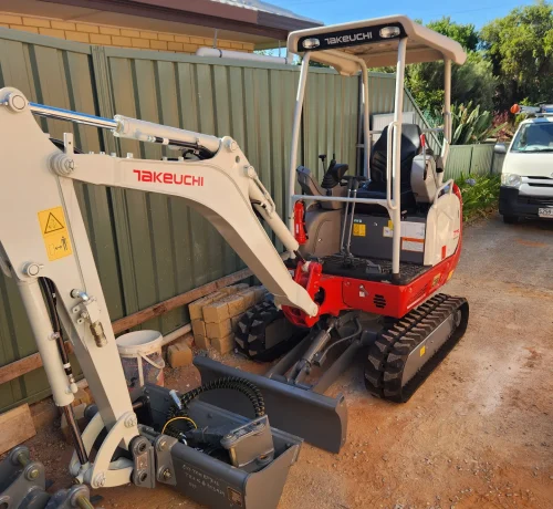 Hole Boring for Retaining Wall Adelaide using professional earthmoving equipment to drill accurate post holes for a retaining wall.