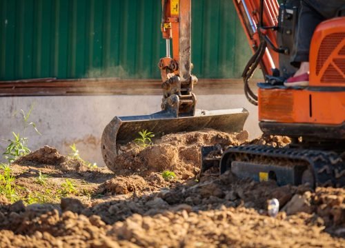How Long Does an Excavation Project Take? Excavator carrying out site excavation for a residential construction project.