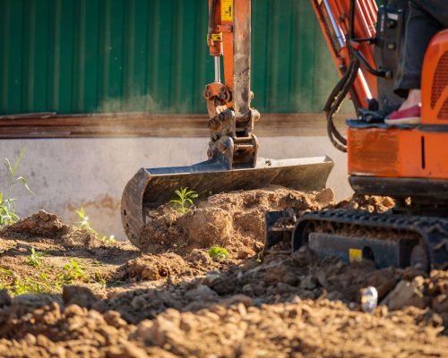 How Long Does an Excavation Project Take? Excavator carrying out site excavation for a residential construction project.