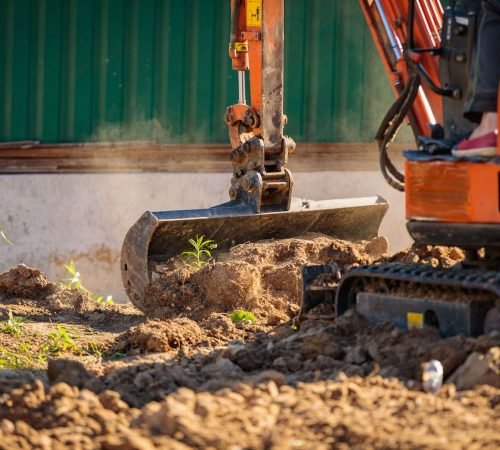 How Long Does an Excavation Project Take? Excavator carrying out site excavation for a residential construction project.